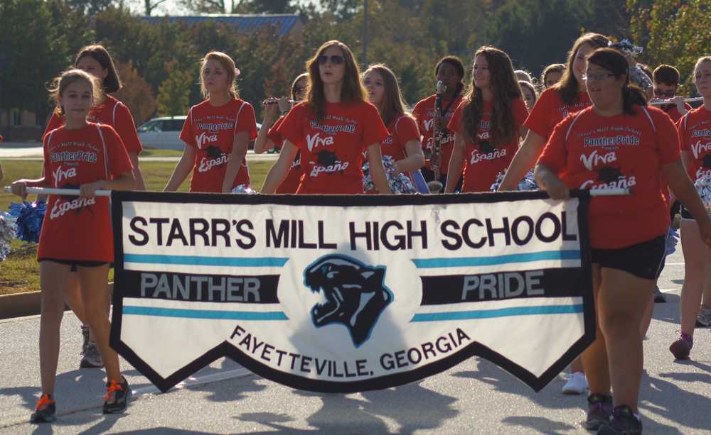 The Panther Pride Marching Band provides the steady beat that accompanies the Homecoming Parade.