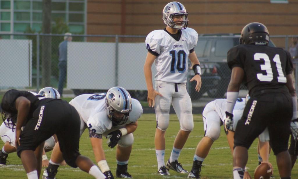 Kyle preparing to take a snap during the Fayette Country game. 