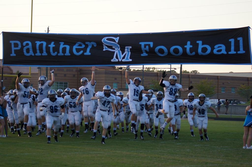 The Panthers get hyped while making an entrance into their second game of the season against Fayette County. 