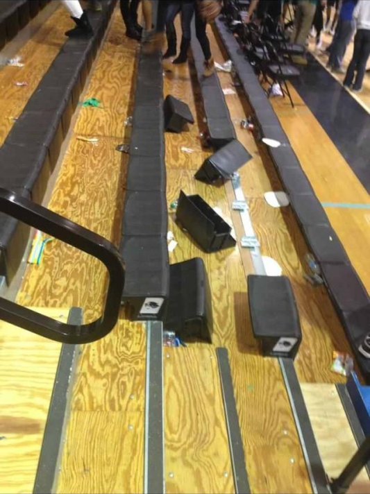 After the final buzzer sounded, McIntosh fans celebrated their victory by storming the court. They also caused damage to the visitor-side bleachers and left trash behind.