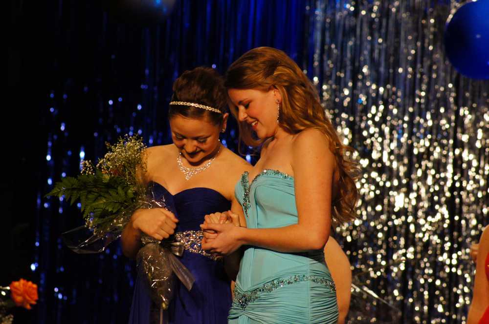 Emma Wernecke (left) and Abigal Feltner (right) wait anxiously for who will be crowned Miss Starrs Mill. 