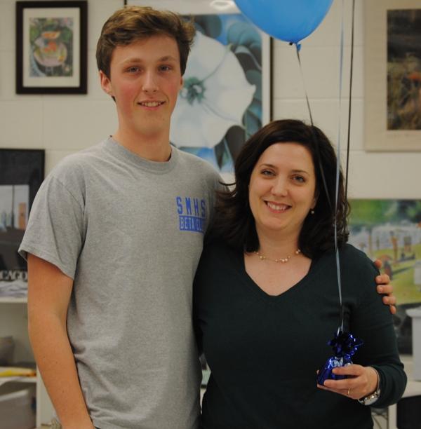 Senior+Shane+Mudrinich+and+English+teacher+Nancy+Close+celebrate+after+the+STAR+Student+and+Teacher+awards+were+announced+on+Jan.+30.+