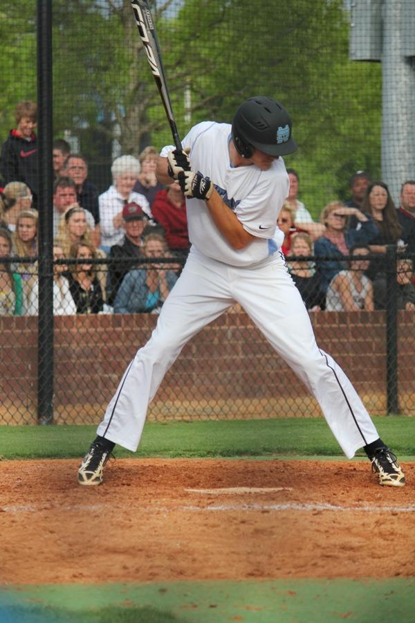 Senior center fielder Ryan Puerifoy flinches just before getting hit by a pitch.