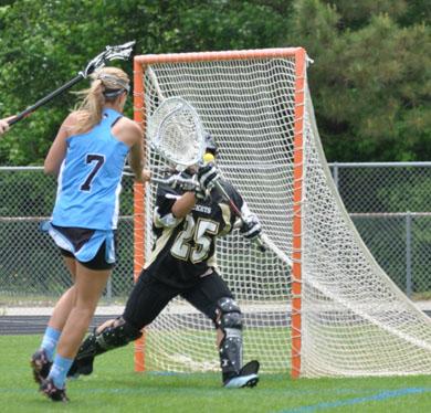 Claire Houghtaling tries to get a shot past the Sprayberry goalie. The Lady Panthers defeat Sprayberry 12-7 in overtime. 