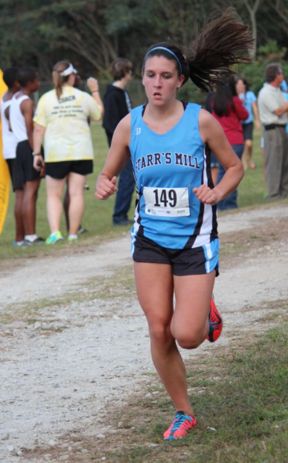 Sophomore Abi Dickinson runs strong during a meet early in the season. 