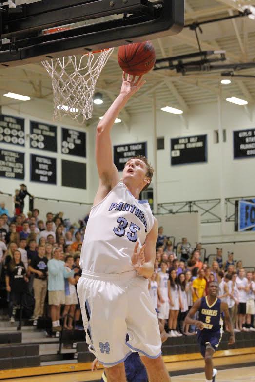 Evan Woods (35) shoots an uncontested lay up against Drew High School on Dec. 6. 