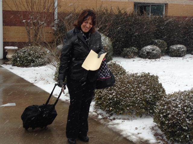 Sra. Rodriguez walking out of Starrs Mill on her way home to enjoy the upcoming snow days!