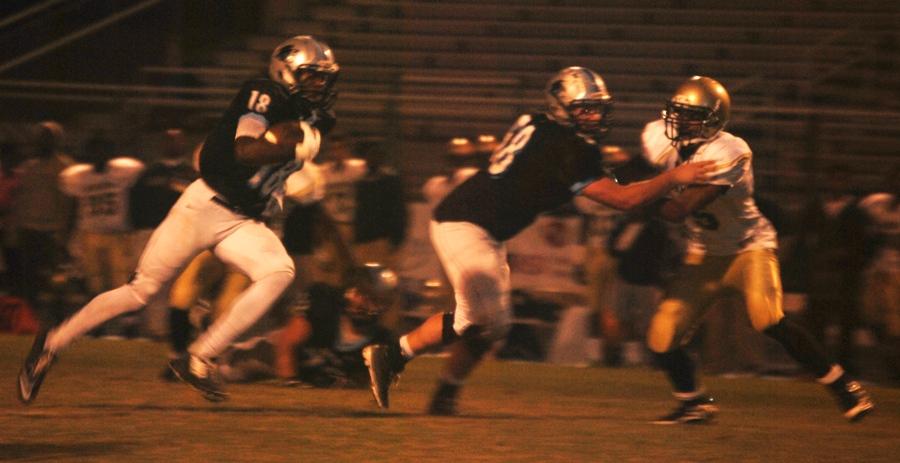 Junior wide receiver Marcel Ray takes off after catching a pass from sophomore quarterback Stone Kasten for his first touchdown catch of the year. It gave the Panthers a 21-0 lead in the first quarter in the game against Morrow.