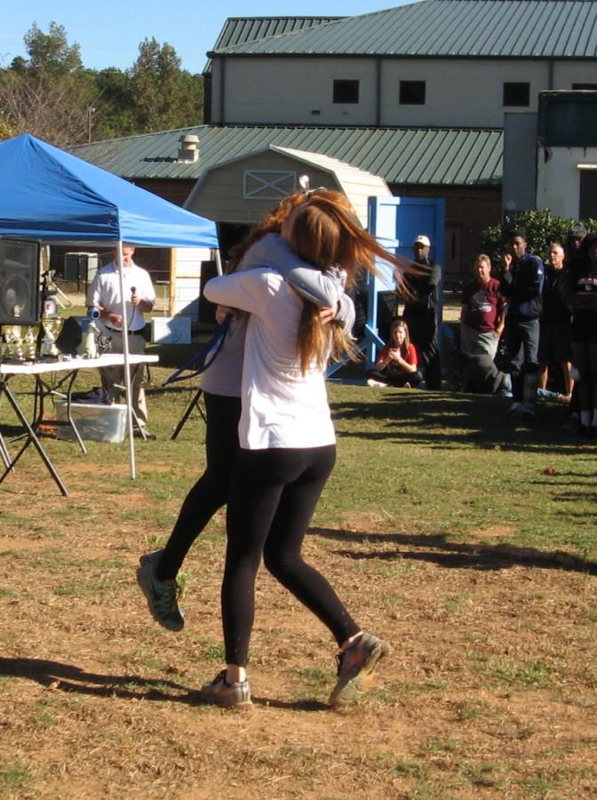 Mary Valli runs up to Sammy Herr with a passionate hug.