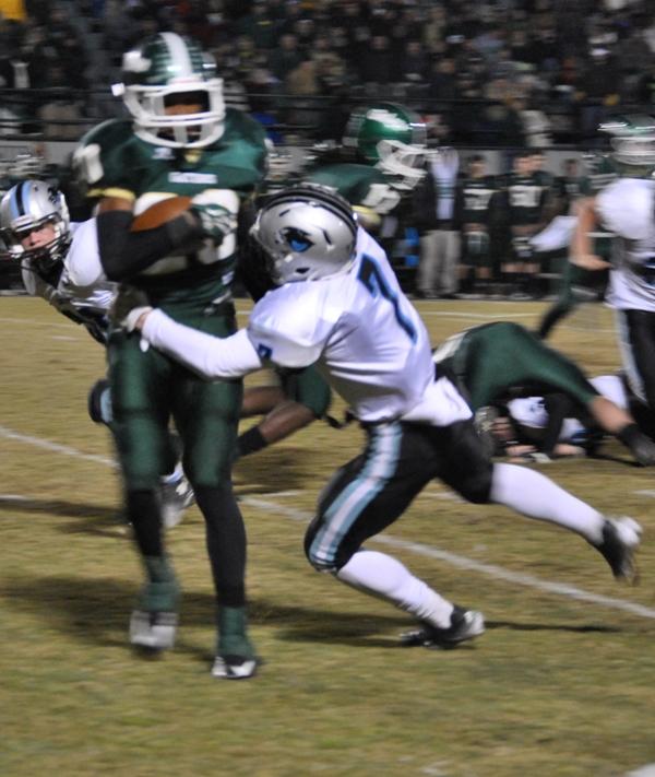 Freshman safety Cole Gilley (7) makes a tackle during Friday nights game against Ware County.