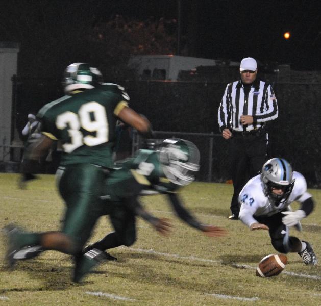 Senior punter Mitch Pattison (33) loses the snap on a potential punt, which was scooped up and scored an early 3rd quarter touchdown. This began a string of miscues and turnovers that eventually led to a 45-10 loss on Friday night to Ware County.