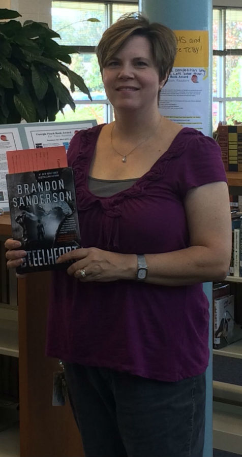 Media specialist LeighAnne Hanie presents Brandon Sandersons Steelheart as one of the book nominees for the Georgia Teen Peach Book Award. 