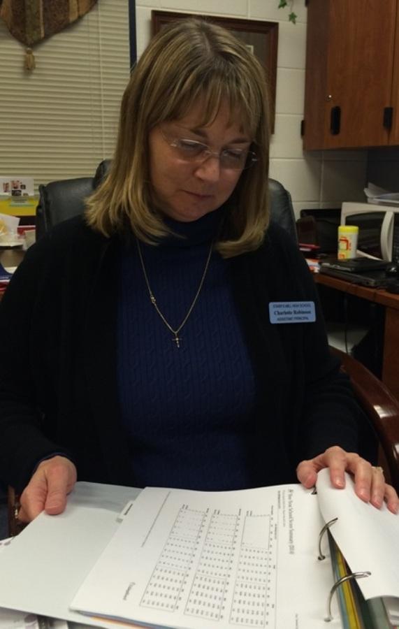 Assistant Principal Charlotte Robinson examines the progression of the school's AP pass rates over the last five years. 
