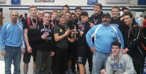 The Wrestling team poses after being awarded the second place trophy at the Chattahoochee River Invitational on Dec. 14.