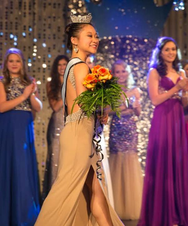 Applauded by her fellow contestants, sophomore Yuri-Grace Ohashi claims the title of Miss Starrs Mill.