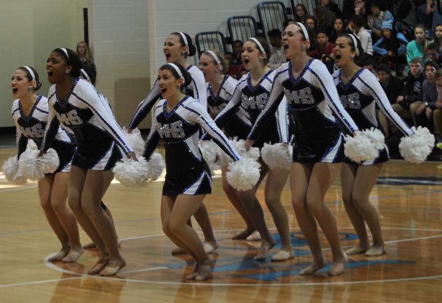 The Pantherette dance team poses in sync during their energy-filled performance. 



