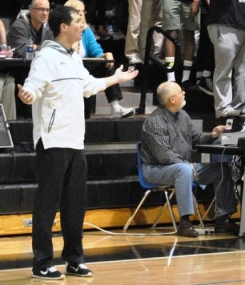 Girls varsity basketball coach Shane Ratliff questions a call by referees during the home game against McIntosh. Coaches give not only their time but invest their emotions as well.