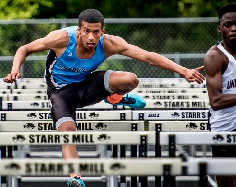 Senior Taylor Brunskole runs in the one of his two hurdle events, both of which he won during the second day of the Region 4-AAAAA championship. 