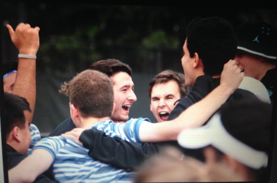 Juniors Dubie Dubin (left) and Max Yelken celebrate after their victory against Brookwood High School.