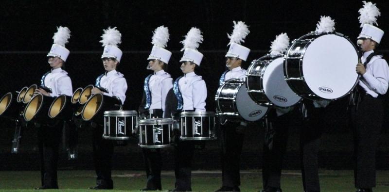 Percussion members await Daniel Goorskys signal to start their performance. 