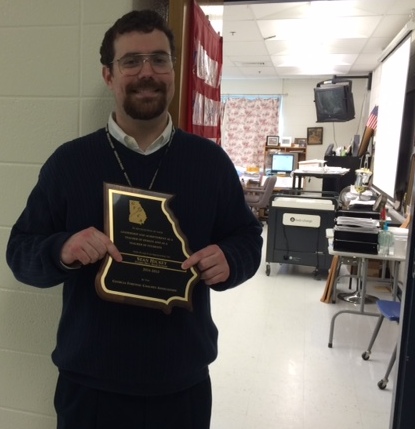 Sean Hickey, who received the Speech Coach of the Year award at the state speech and debate tournament, has been coaching the team for seven years. While in high school, Hickey was a member of the team.  