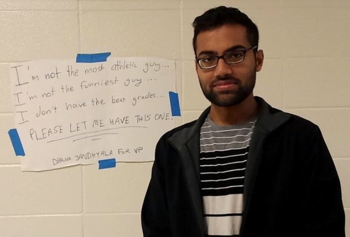 Junior Dhruva Jandhyala proudly displays his campaign poster for vice presidency. He said he took the honest, heartfelt approach, but juniors Chandler Houck and Tyler Jeffares will be the upcoming co-vice presidents. 