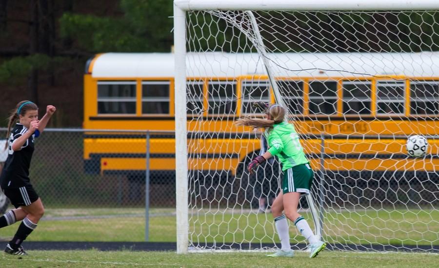 Junior+Riley+Clark+celebrates+for+one+of+her+three+goals+against+Greenbriar.