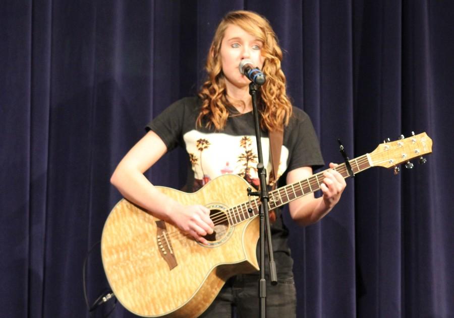 Though a beginner at guitar, sophomore Cali Gaynor showed no signs of novelty as she played her guitar as she also sang Green Days Good Riddance (Time of your Life).