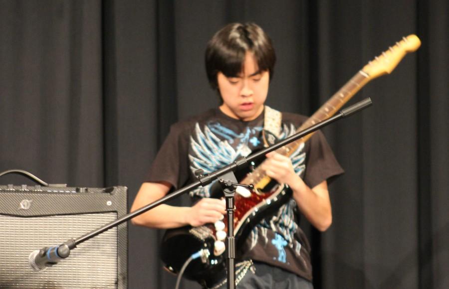 Freshman Luke Miyazaki rocked out with several hair flips along with dramatic swings of his guitar as he played  Pink Floyd’s “Crazy.
