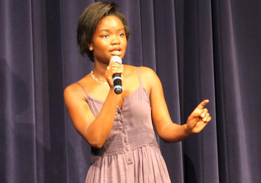 With the rain coming down in buckets outside, senior Sydney Johnson offered the audience members a warm embrace as she sang Adeles Make You Feel My Love.