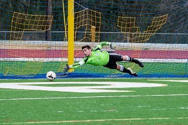 Senior Mitch Pattison makes a save in their 2-0 loss against St. Pius. The Panthers ended their season 14-5-1.  They lost to Clarkston in the Sweet 16 round of the state AAAAA playoffs. 