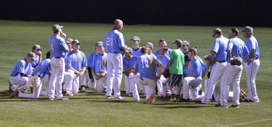 Head coach Brent Moseley addresses the team after the Panthers lost the best-of-three state playoff series against South Effingham. 