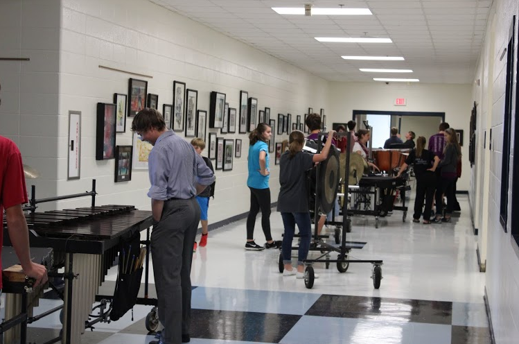 Sept. 11, 2015- Percussionists in Scott King’s concert band class move their equipment from the band room to the auditorium.  The band classes will hold their fall concert on Nov. 5 in Duke Auditorium.