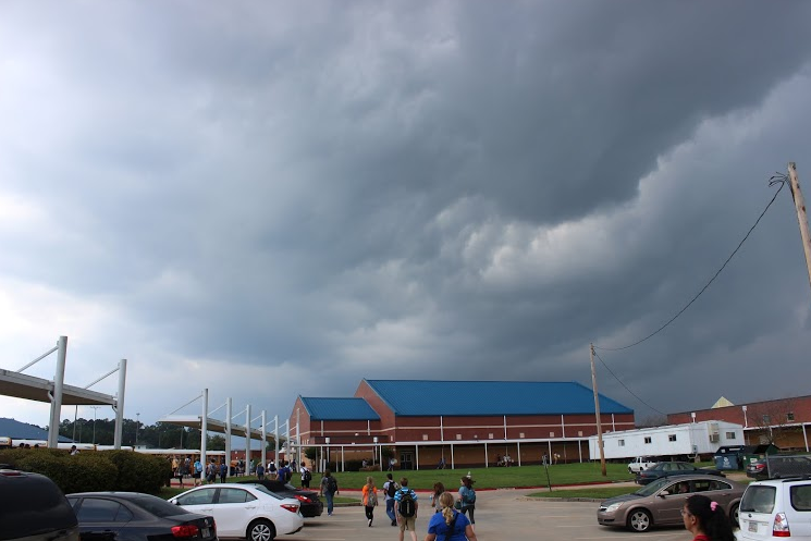 Sept. 10, 2015- An oncoming storm begins to sprinkle on the students as they walk toward their buses and head home for the evening.