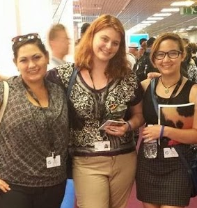 Alumna Anne Rentz (from right) poses with new friends Devyn Herron and Melissa Lewelling while exploring the tents of the Cannes Film Festival.