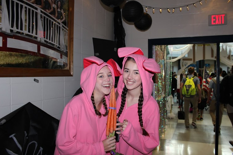 Sept. 16, 2015 - Sophomore girls dressed as bunnies for character day pose in the “Magic Kingdom” hallway decorated by the senior class. 