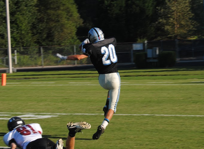 A second quarter touchdown pass by Panther freshman quarterback Sean King keeps the game against Whitewater from being scoreless at halftime. The game was a defensive battle, ending at 15-8.