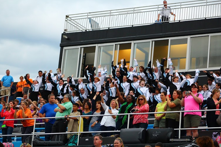 Sept. 21, 2015 - Members of the Panther Pride marching band join in as the eighth graders play “The Hey Song.” Bands from every middle and high school in Fayette County begin their competition season with a band exhibition, and this year Starr’s Mill hosted it. 