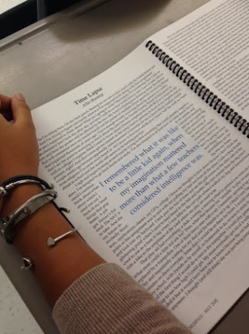 A student reads junior Allie Bunting’s piece, “Time Lapse” in the 2015 issue of Musings.