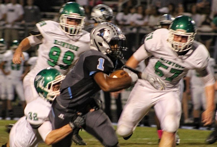 Sophomore running back drags a Chief defender on his way to a 238-yard and four-touchdown performance against McIntosh. He has eight touchdowns in his last two games. 