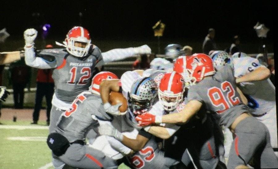 Nov. 20, 2015 - Allatoona defenders swarm a Starrs Mill running back.  Despite having more offensive yards than the Buccaneers, the Panthers ended their season with a 30-14 loss in the second round of the state playoffs.