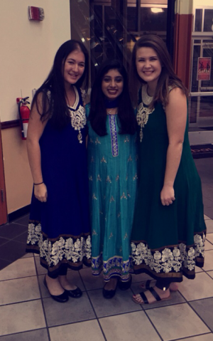 Seniors Allie Merritt and Pamela Jew pose with their friend who brought them to play Garba during mid-December. “It was a great and eye-opening experience where I met new people and participated in another culture,” Jew said.