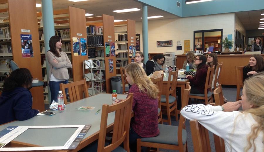Jan. 28, 2016 - Romily Bernard, author of last month's Ex Libris book choice“Find Me,” answers students’ questions while they eat lunch in the media center during “Feed Your Need to Read” week.