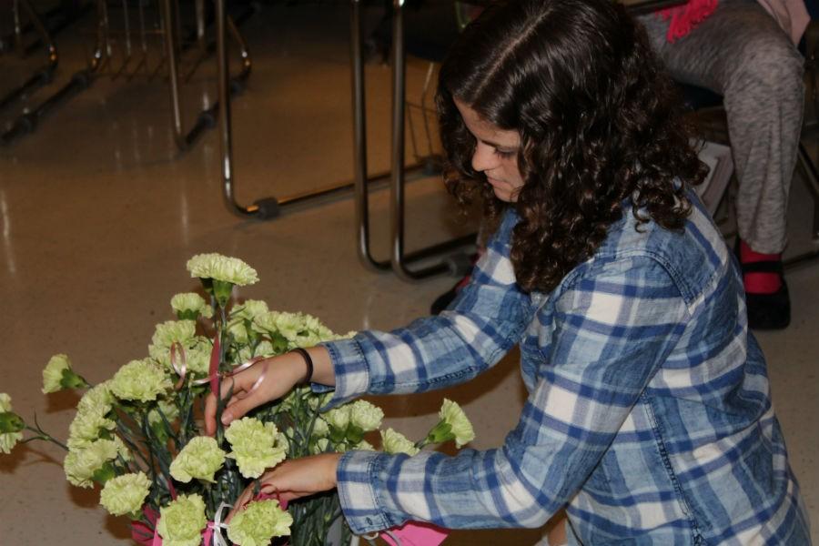 Feb. 11 - The creative writing classes sold Valentine’s Day carnations as a way to spread love and raise money for the “Musings” literary magazine. Unfortunately, these flowers die within a week and only serve as a superficial token of love. 

