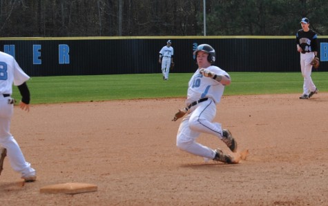 Feb. 6, 2016 - A Panther baseball player slides into third base during the split-squad scrimmage. Members of the varsity team played one another on Feb. 6 in preparation for their first home game scheduled for Feb. 22 against Union Grove.