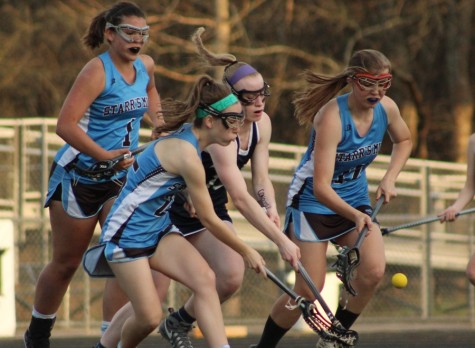 March 16, 2016 - Three Lady Panthers and a Harrison player fight for possession. The game against Harrison was an aggressive and physical one from both teams, but the Lady Panthers could not outscore the visiting Hoyas.