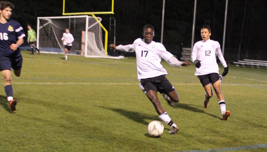 March 2, 2016 - A sophomore player for Starr’s Mill dribbles the ball to the other side of the field. Despite the team’s young roster, the Panthers held the visiting Golden Lions to only two goals, although St. Pius maintained possession for most of the game. 