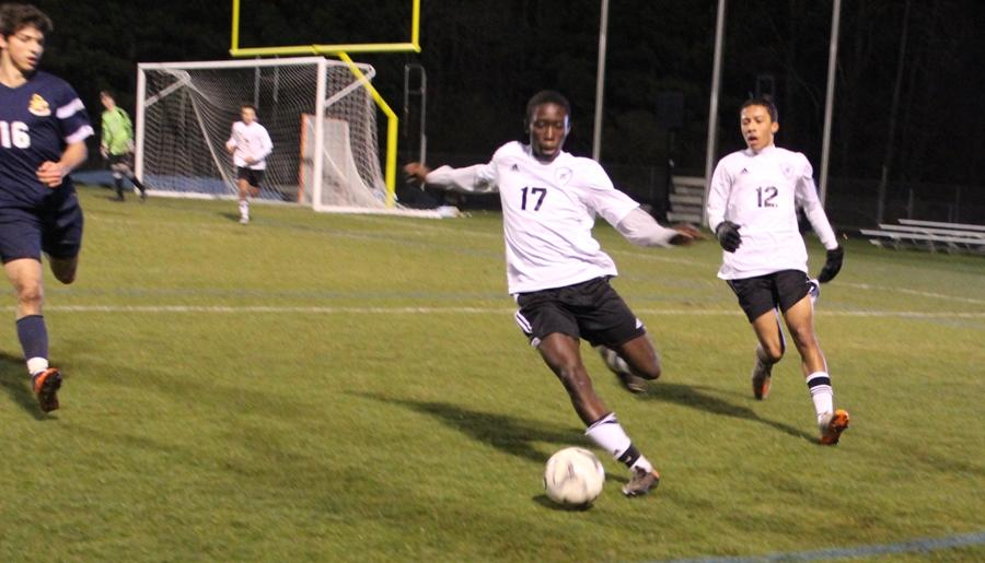 March 2, 2016 - A sophomore player for Starr’s Mill dribbles the ball to the other side of the field. Despite the team’s young roster, the Panthers held the visiting Golden Lions to only two goals, although St. Pius maintained possession for most of the game.