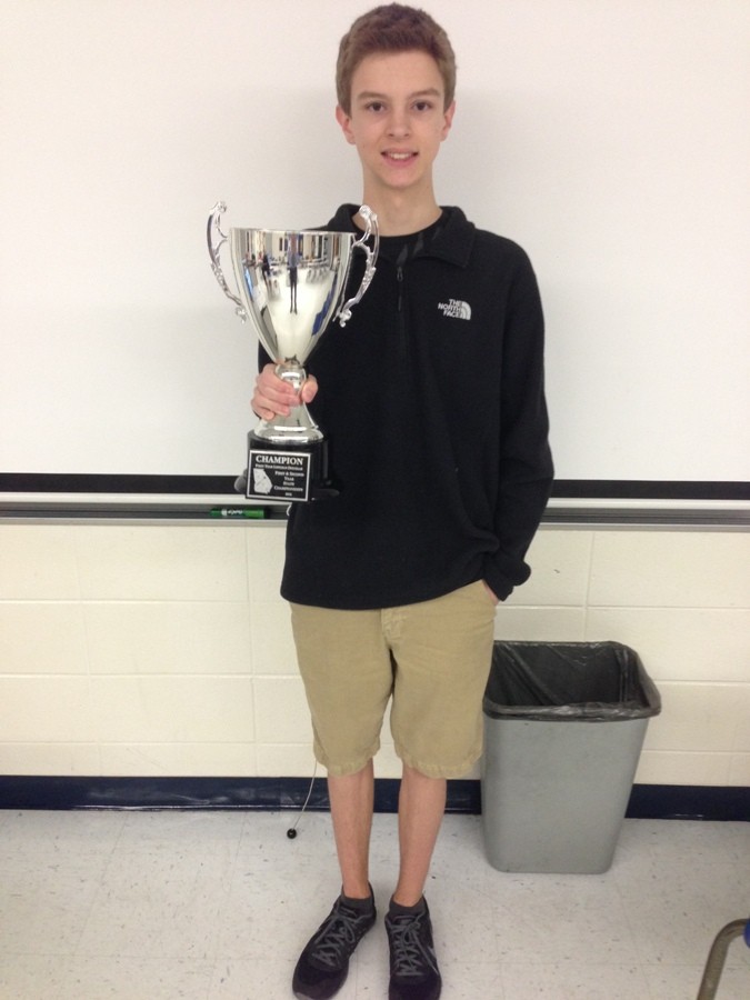 Feb. 7, 2016 - A freshman debater holds the trophy he won at Calhoun High School. Although the speech and debate team did not win overall, he represented the Mill by winning the entire Lincoln Douglas division.  