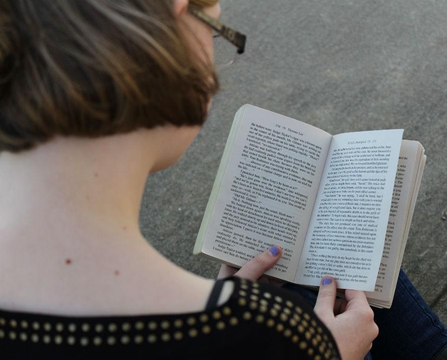 Students read along to the novel “To Kill a Mockingbird” with English Teacher Juliana Wright. As they read the book, Wright picks out the uses of figurative language that Harper Lee includes. Lee’s death at 89 on Feb. 12, but her work lives on in classrooms and readers’ hearts.